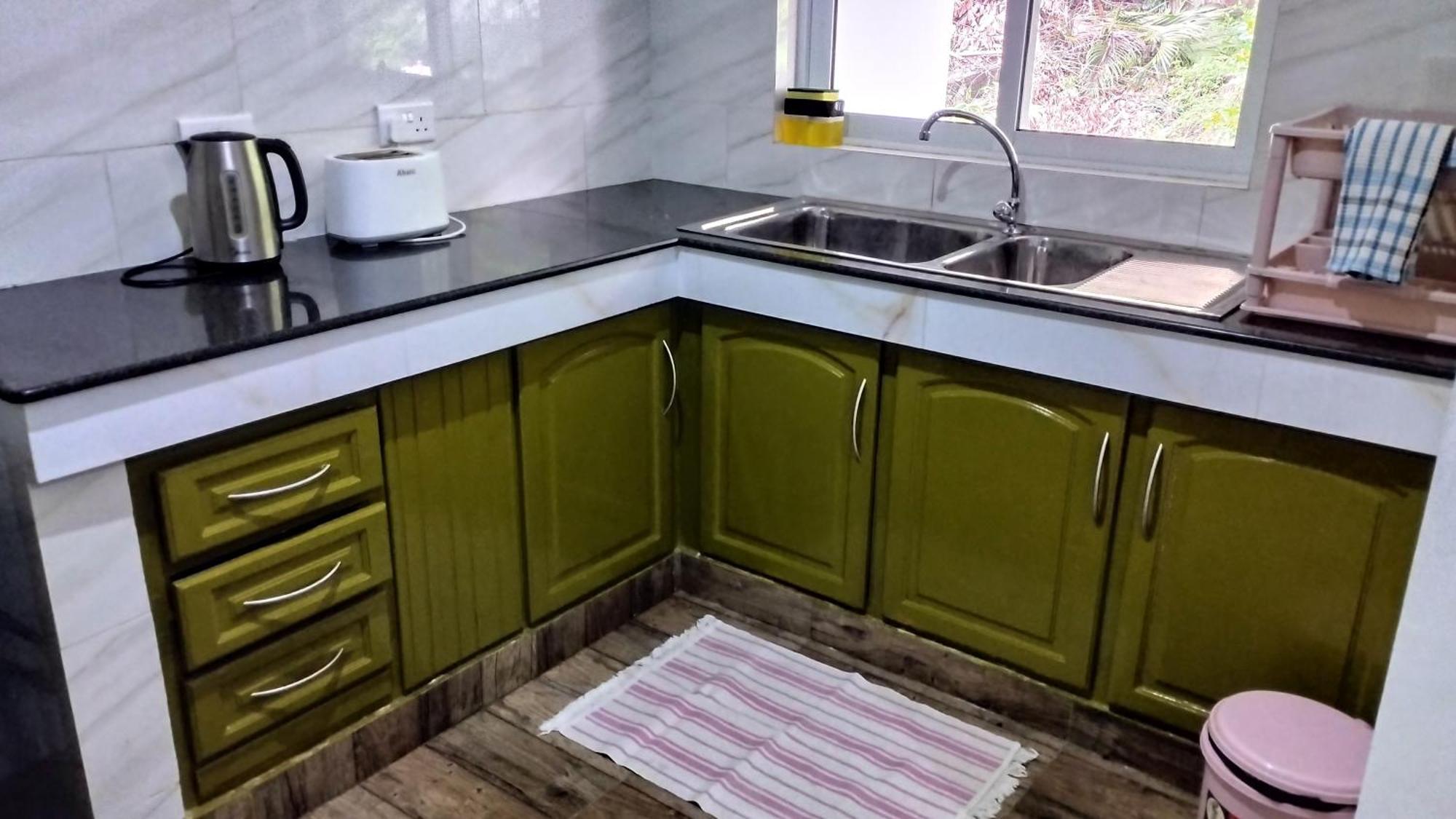 Dovass Self Catering Apartments Такамака Номер фото